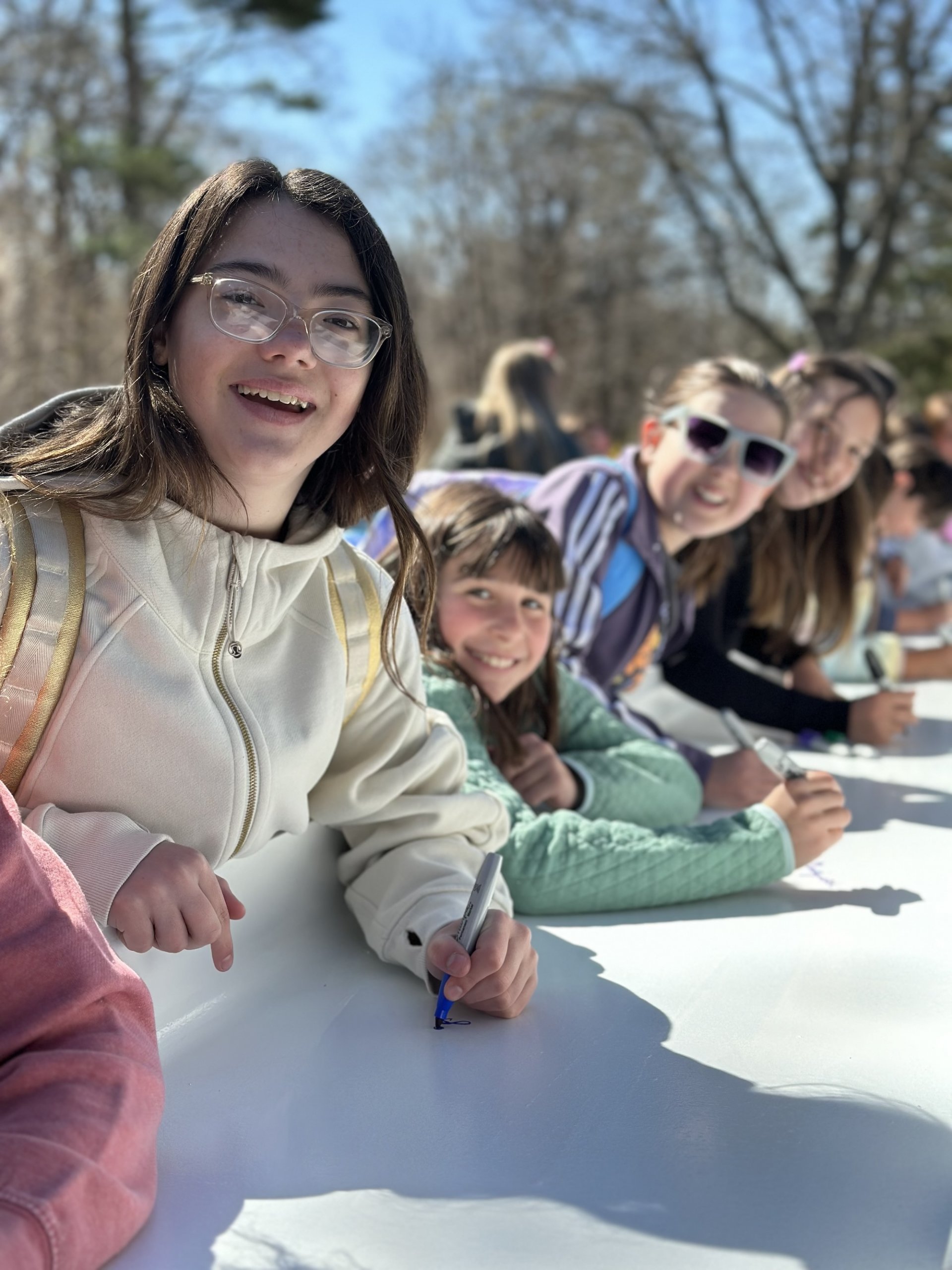 Landmark students sign beam_2