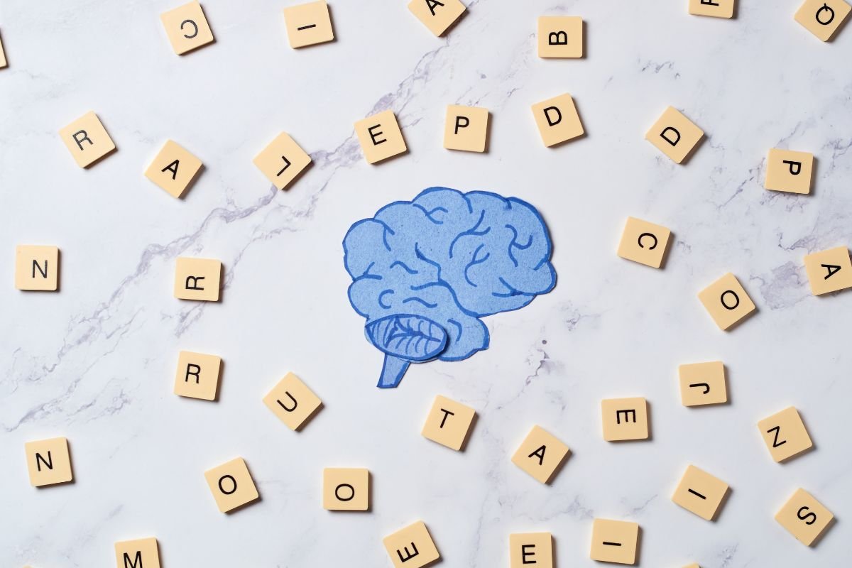 brain and letters scattered around