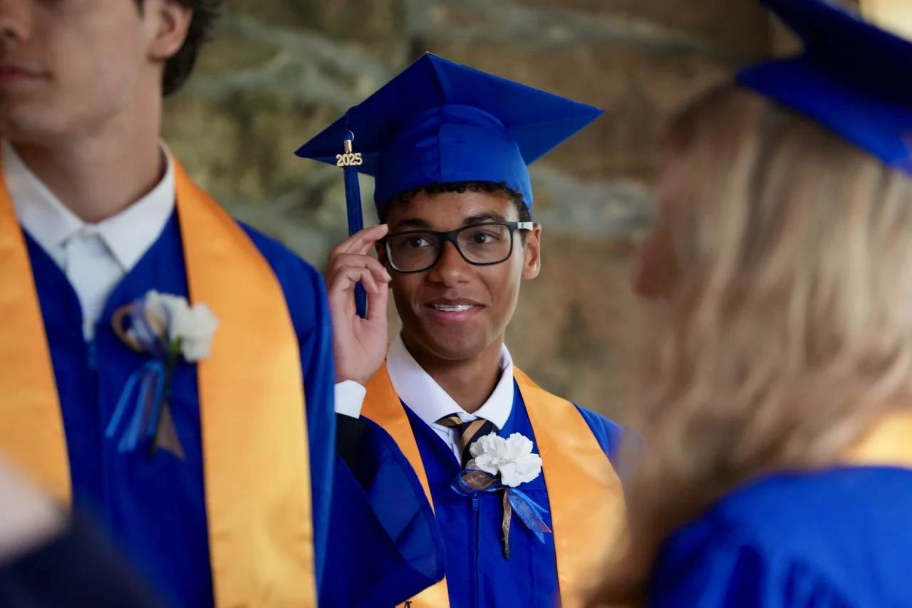senior graduating in cap and gown
