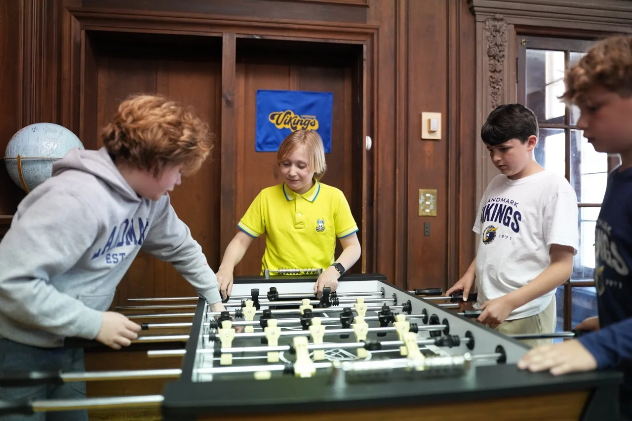 students playing foosball