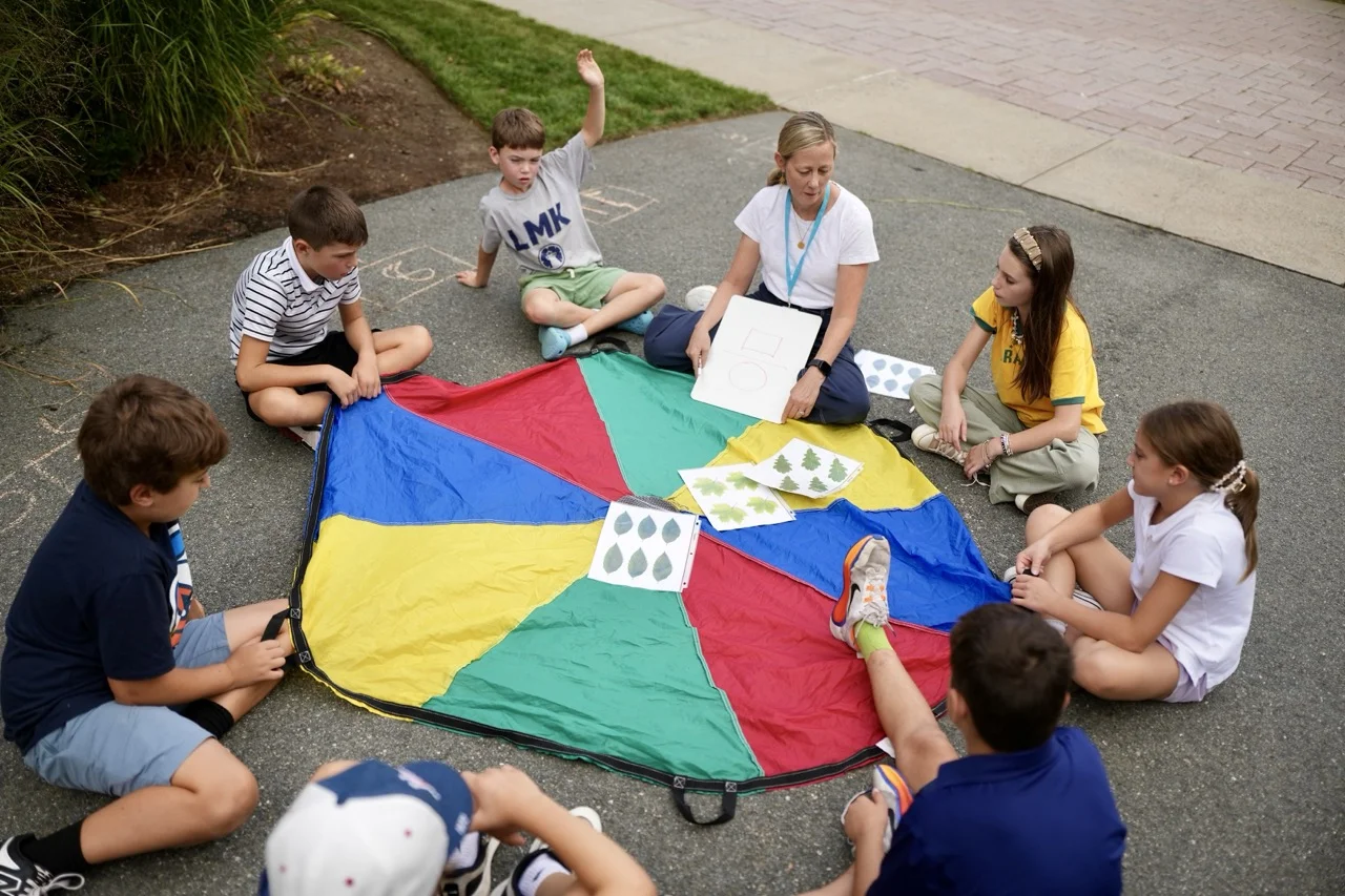 class of seven students working on hands on project
