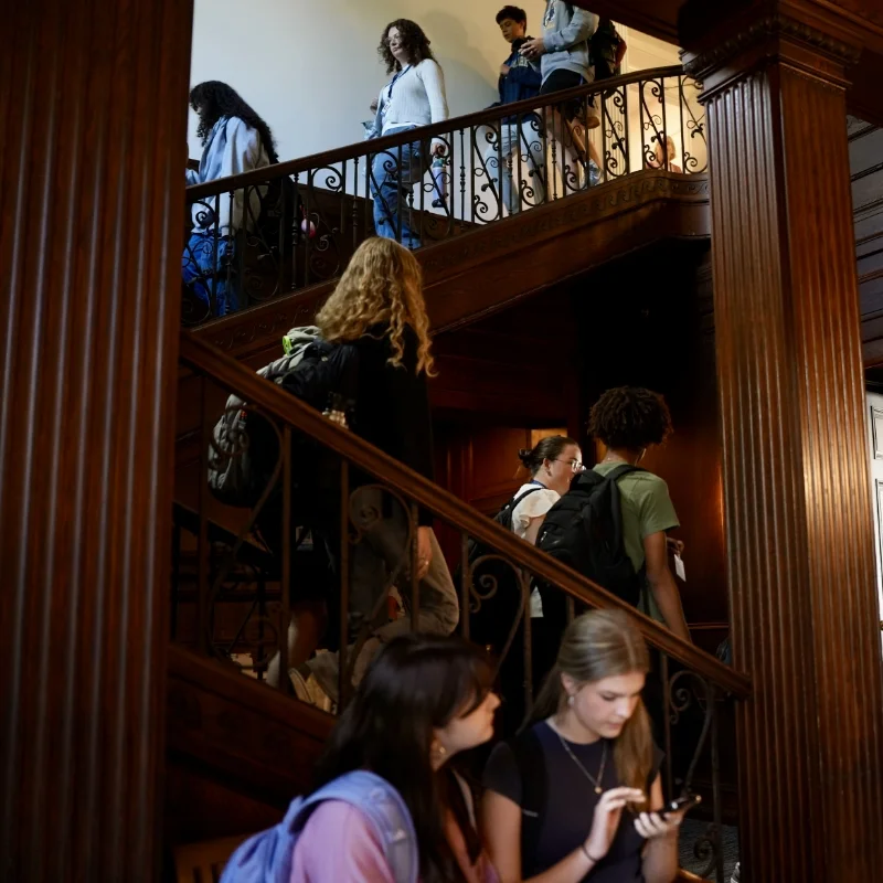 high school students walking on stairs