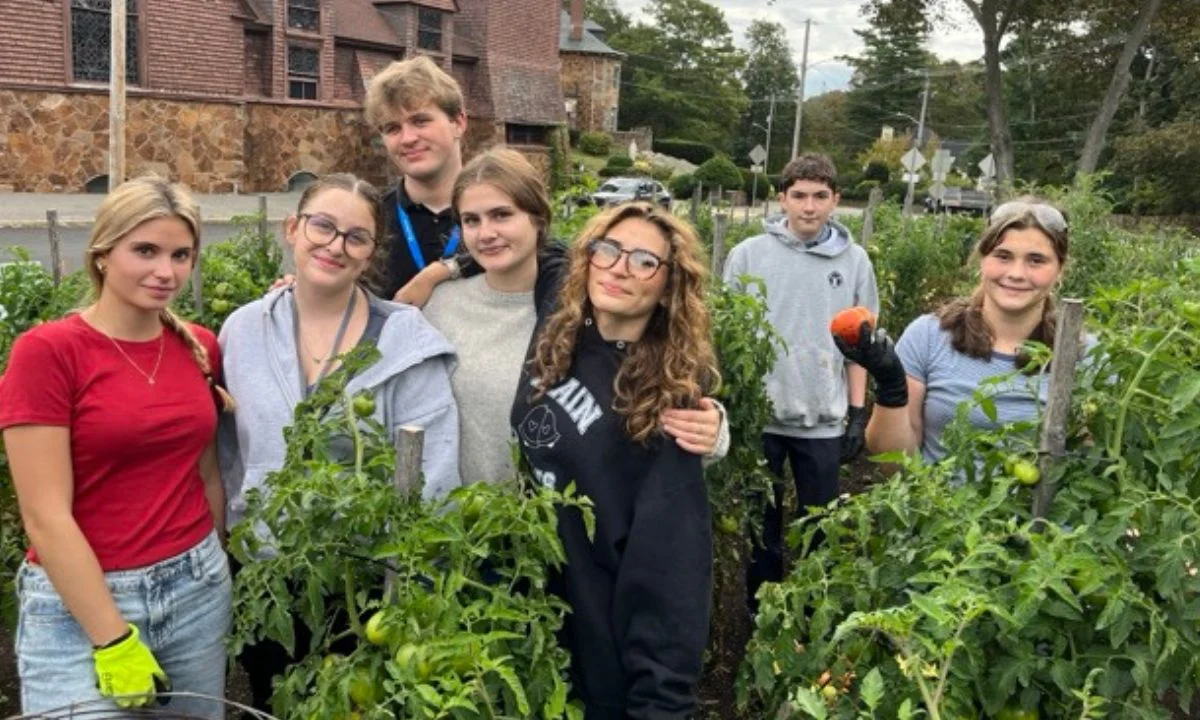 students helping at local farm for community service