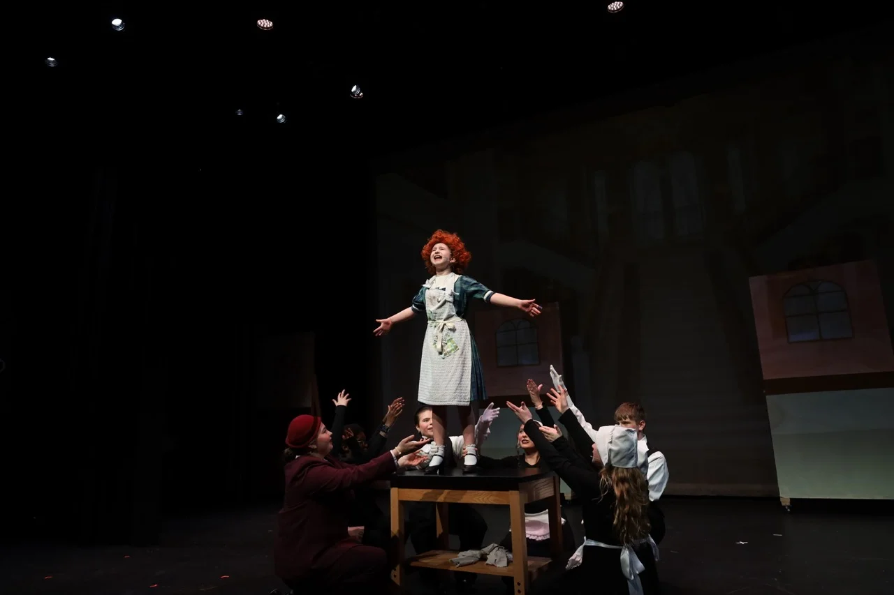 student play on stage
