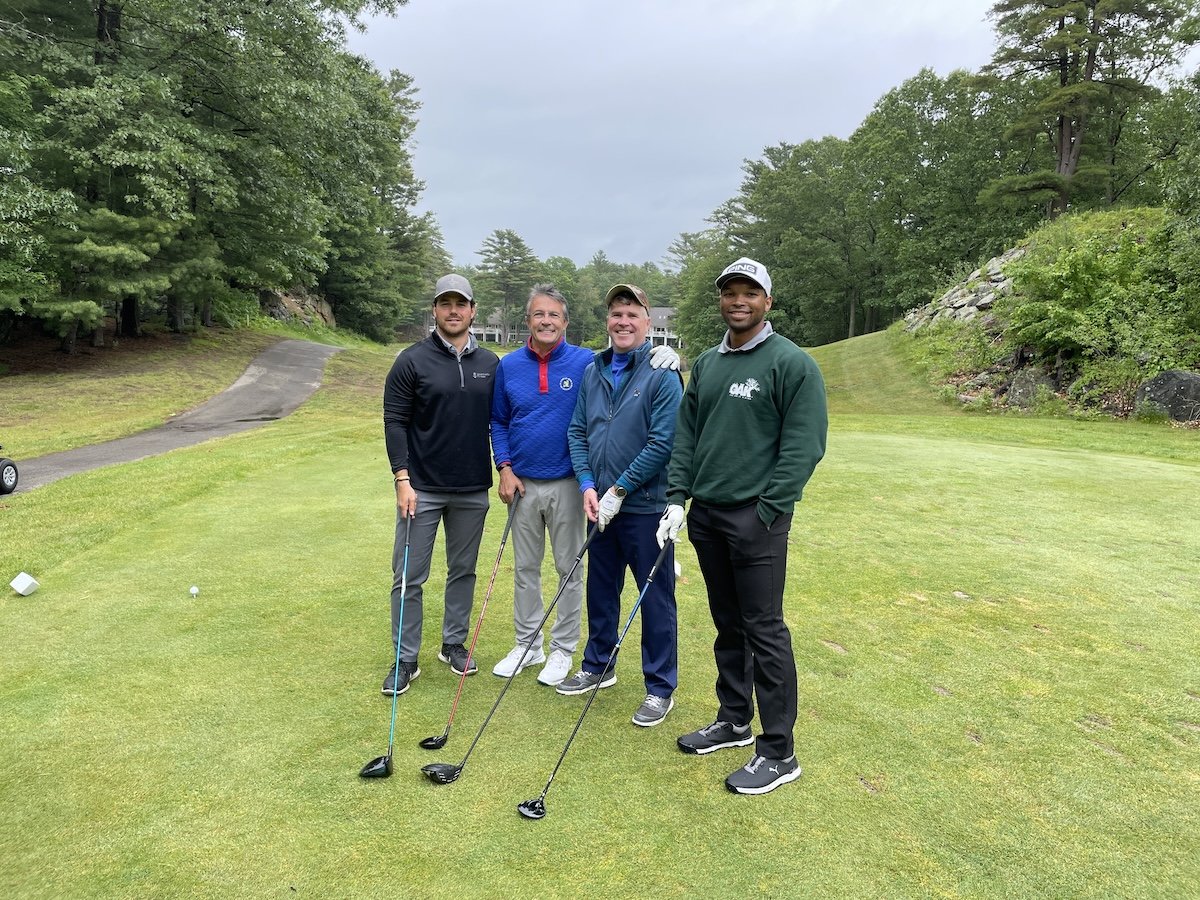 group of people at golf benefit