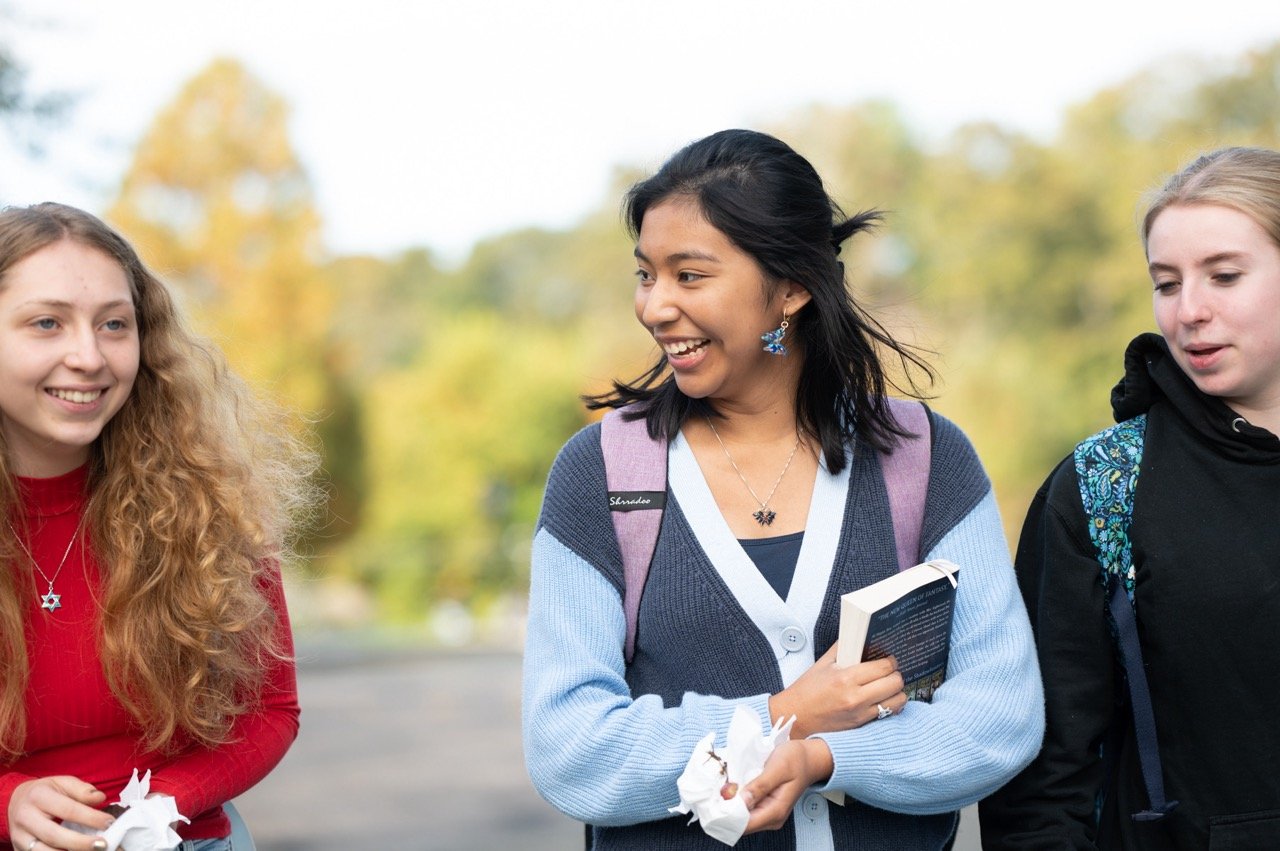 students talking to each other