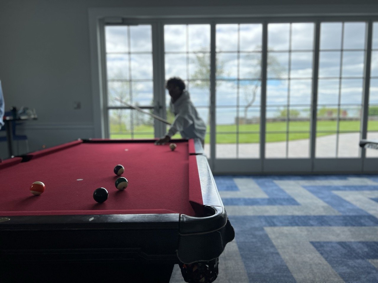 New Student Center Game Room with Nana Wall Opening To Outdoor Patios
