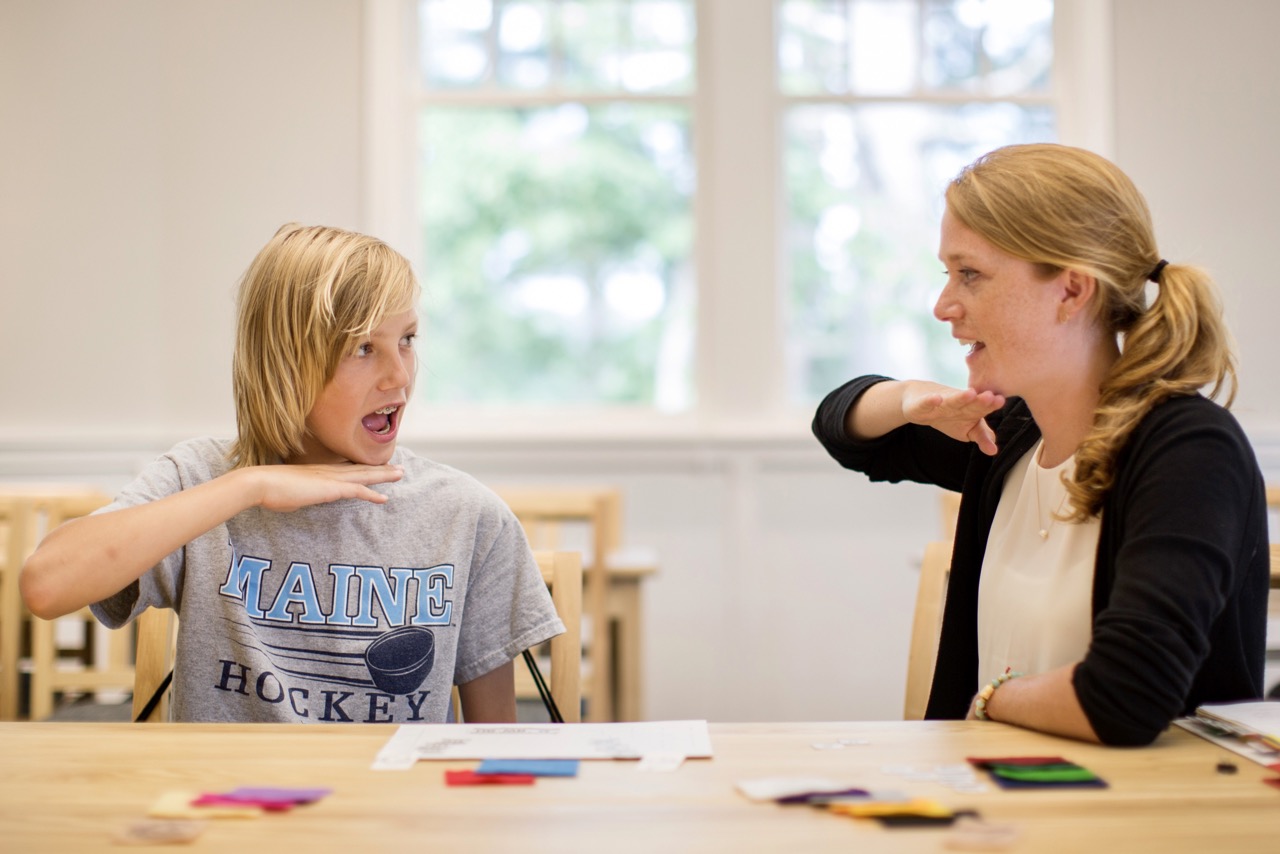 student and teacher in reading tutorial