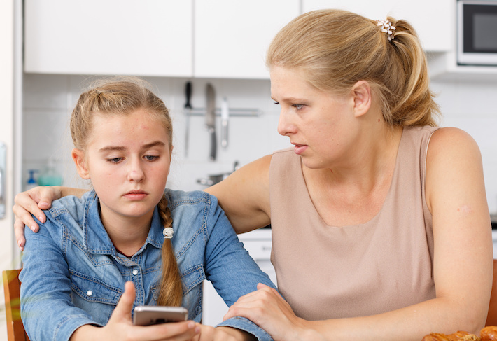 mother with daughter upset bullying