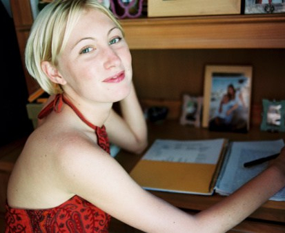 girl smiling desk