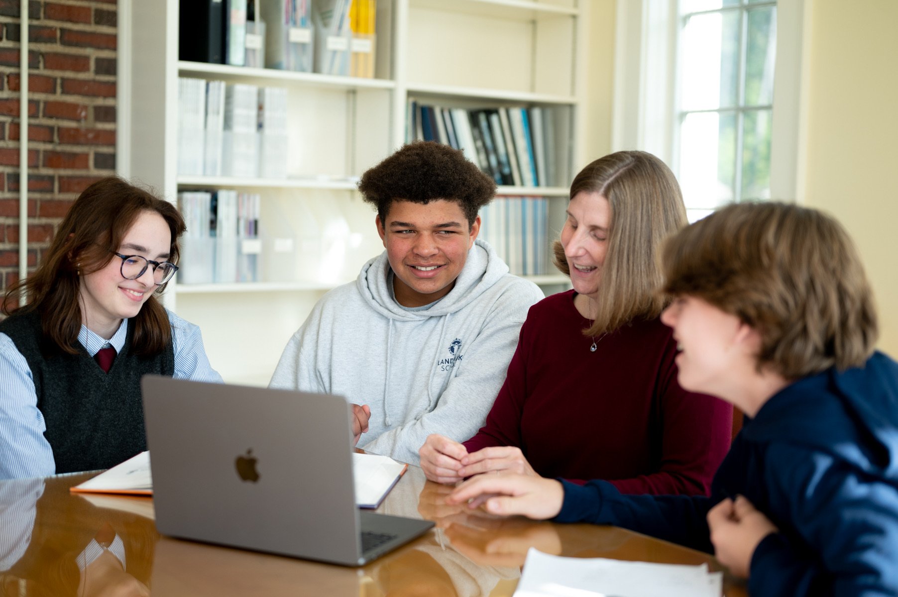 high school students learning in small group