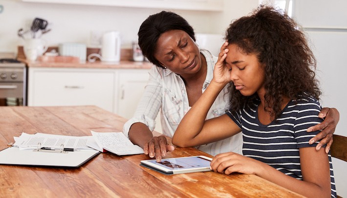 girl and mother at table anxiety learning disability