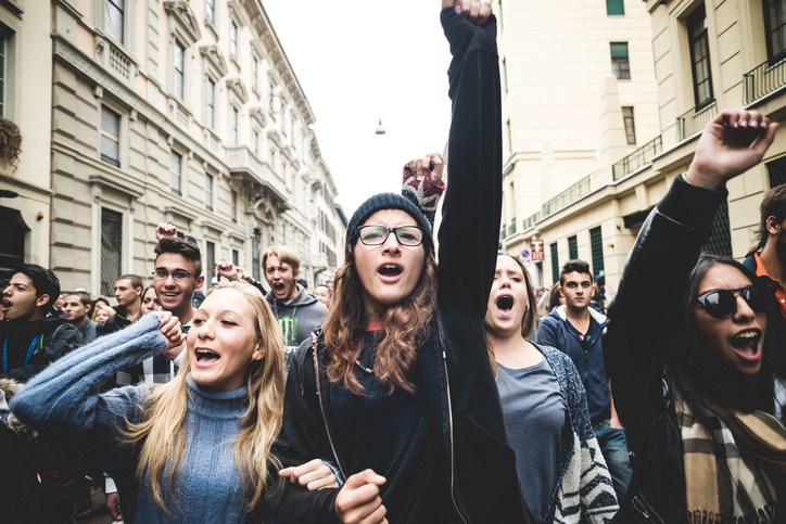 people marching protesting