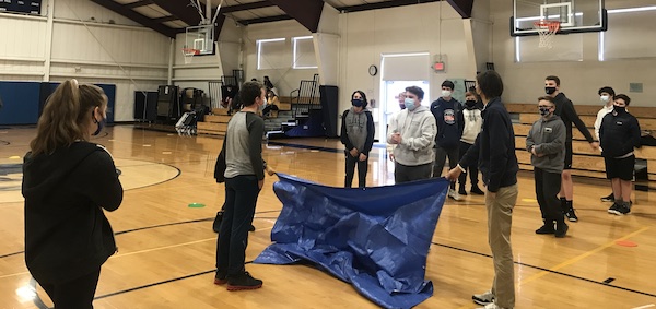 landmark middle school students playing tarp game