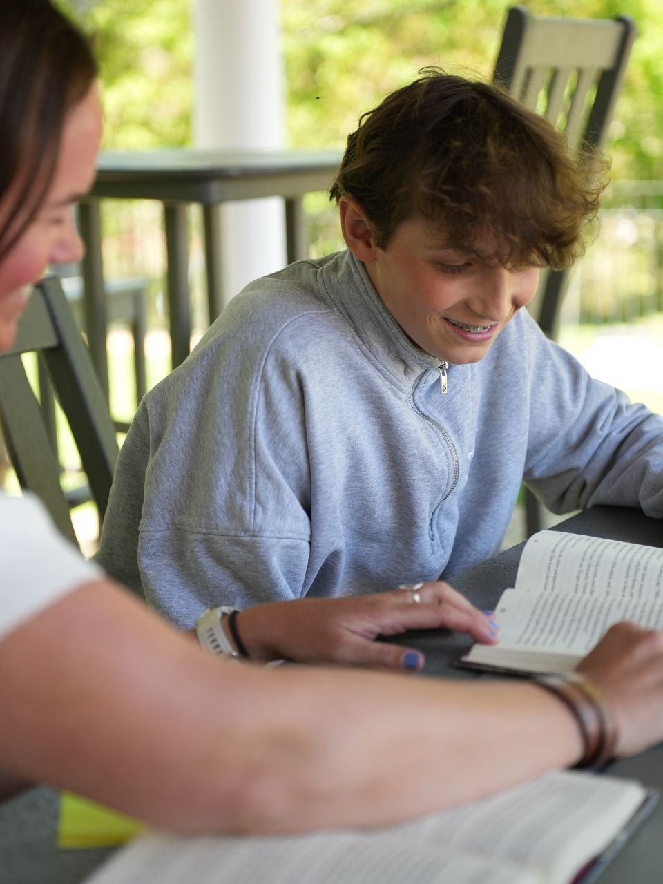 student and teacher reading