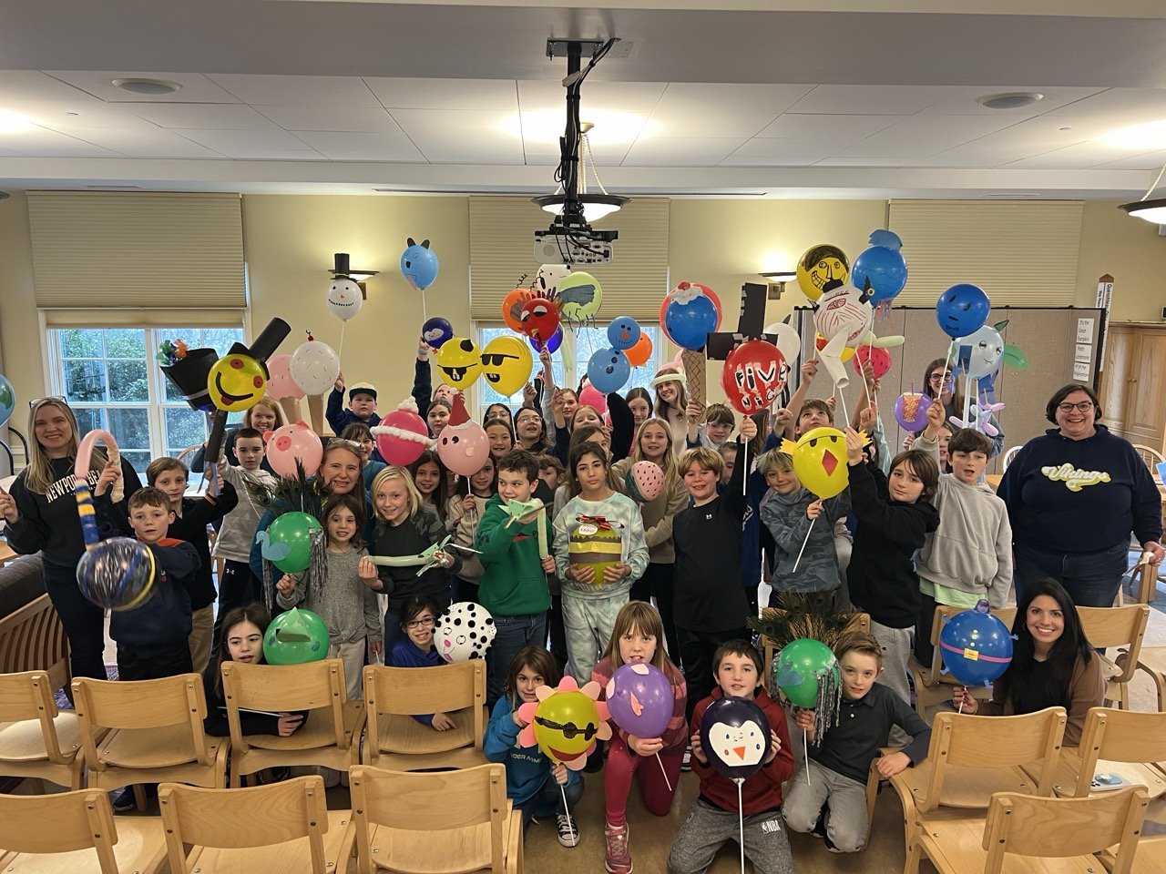 students showing off their balloons for EMS parade