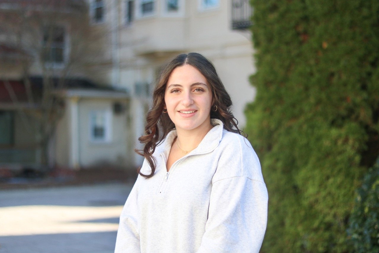 student smiling at camera