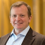 headshot of Thilo Henkes