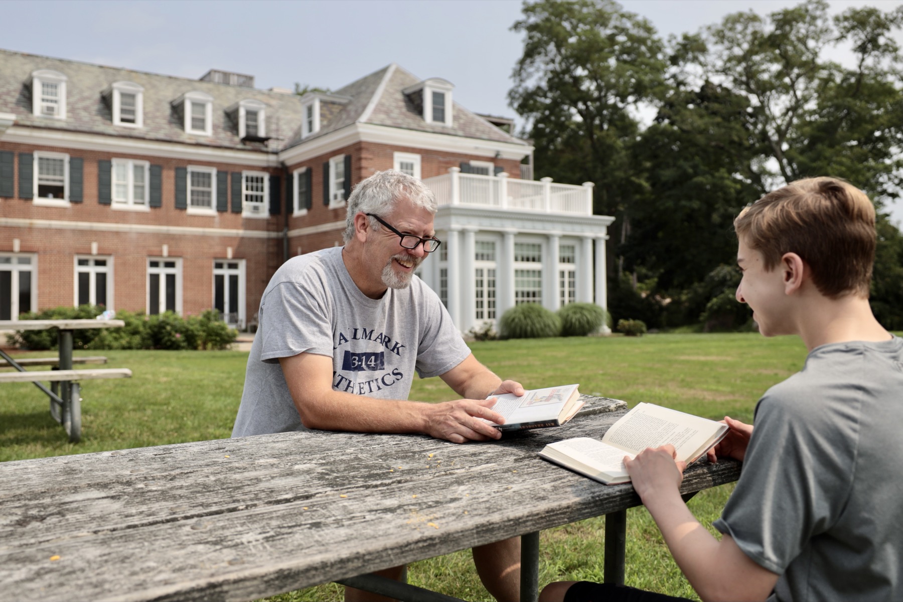 teacher outside with student