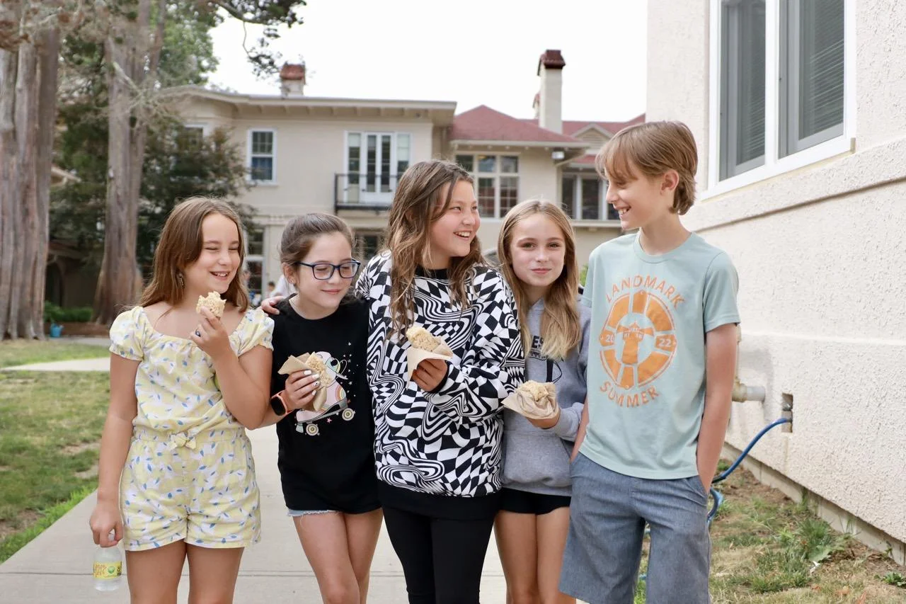group of students eating marshmallow cereal treats